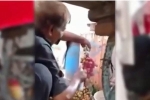 Clip sốc: Người bán trái cây liên tục phun sơn 'hô biến' nho xanh thành nho đỏ