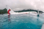 Hai người Việt trên máy bay Papua New Guinea lao xuống đầm đã về nước