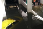 Máy bơm chạy hết công suất 'giải cứu' BMW, Mercedes, Range Rover cùng nhiều ô tô, xe máy ngập nước trong hầm chung cư ở Đà Nẵng
