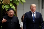 Hai ông Trump, Kim đi bộ trong vườn ở Metropole