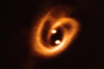 Phát hiện 2 ngôi sao song sinh đang được 'ấp' trong đĩa vật chất