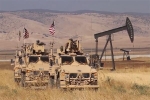 Hai mẫu thiết giáp Mỹ triển khai canh mỏ dầu Syria