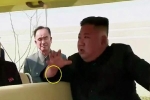 Vết đỏ gây đồn đoán trên cổ tay Kim Jong-un ngày tái xuất