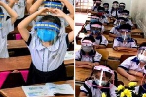 Học sinh đeo mặt nạ che giọt bắn ở trường: Sáng tạo của địa phương, học sinh có chịu nổi?