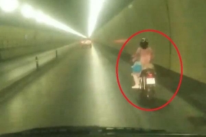 Người phụ nữ chạy xe máy vượt 3 chốt kiểm soát ở hầm Hải Vân