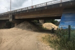 Bắc Giang: Bãi tập kết vật liệu xây dựng, than trái phép hoạt động tại chân cầu Lục Nam