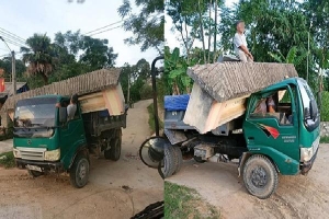 Hình ảnh xe tải 'cõng' cổng làng ở Hà Tĩnh gây xôn xao, thái độ của tài xế mới khó hiểu