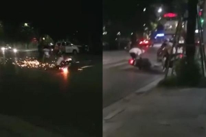 2 thanh niên chạy xe tốc độ cao, cả người và xe máy mài xuống đường tóe lửa vài mét