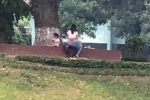 Hình ảnh gây sốc ở công viên Thủ Lệ: Cặp đôi thản nhiên làm hành động 'nhạy cảm', mặc cho có trẻ nhỏ ngồi chơi ngay bên cạnh