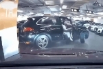 CLIP: Mở cửa bước xuống khi ôtô đang lùi, nữ tài xế bị xe xịn 'hành' chóng mặt