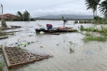 Làng mạc chìm trong biển nước khi bão Molave quét qua Philippines