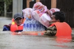 Vì sao Nghệ An - Hà Tĩnh mưa lớn, lũ chạm mái nhà?