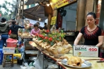 Gà cánh tiên 'hút khách' trong phiên chợ Rằm cuối năm giữa phố Hà Nội: Chủ quán luộc gà gấp rút, shipper giao mỏi chân không kịp