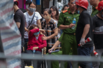 Những chuyến xe chở thi thể sau vụ cháy làm 4 người chết ở Hà Nội