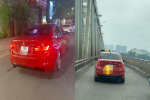 BMW tiền tỉ gắn biển taxi chạy trên phố Hà Nội khiến người đi đường xôn xao, chụp ảnh đăng lên MXH
