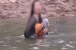 Mẹ ôm con nhảy sông tự tử được đội cứu hộ giúp đỡ, hành động tiếp theo của cô ta làm dấy lên căm phẫn: 'Ác hơn thú dữ'