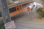 Clip: Cố vượt qua đường ray, xe tải bị tàu hỏa tông 'rụng đầu'