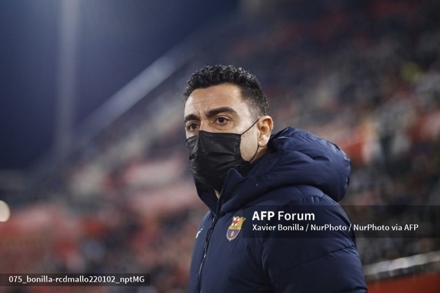 Xavi chật vật cùng Barca đi tiếp tại Cúp nhà Vua. Ảnh: AFP.