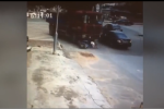 Clip: Bị xe tải 'nuốt chửng' người phụ nữ thoát chết khó tin