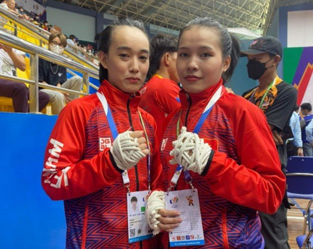 2 nữ võ sĩ Việt Nam bị tước HCV SEA Games 31 đầy tiếc nuối (Ảnh: Thanh Niên)