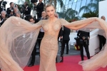 Vì sao các người đẹp được mặc hở thoải mái tại Cannes?