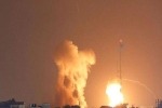 Israel không kích, rốc-két đáp trả lại phóng từ Gaza