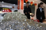 Công ty Trung Quốc trả thù nhân viên bằng 60 kg tiền xu