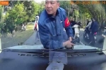 Nhảy lên nắp ca pô xe ô tô du khách, một nhân viên ở Yên Tử bị tạm đình chỉ công việc