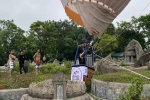 Sự thật hình ảnh khinh khí cầu đáp xuống nghĩa trang
