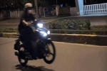 Xử lý cô gái 21 tuổi lái xe máy bằng một bánh trên đường phố